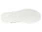 Chaussure blanche U.S. Grand Polo avec une semelle en caoutchouc.