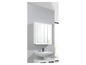 Une armoire de salle de bain blanche avec des portes miroir au-dessus d'un lavabo.