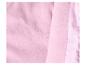 Tissu polaire rose et tissu lisse : détail d'un vêtement.