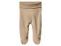 Leggings bébé beige avec ceinture retroussée.