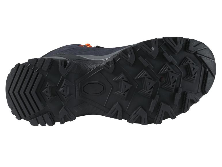 Chaussure de randonnée noire avec lacets orange, vue de dessous.