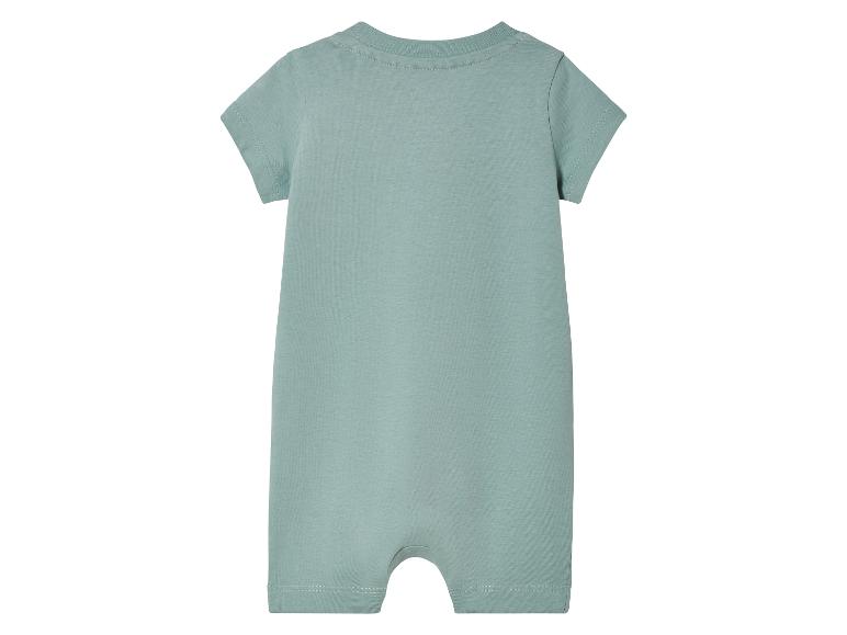 Combinaison bébé vert clair à manches courtes.