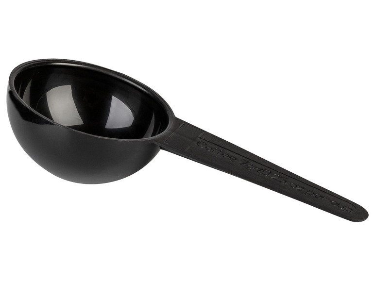 Une cuillère doseuse en plastique noir pour le café.