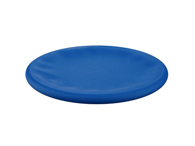 Assiette bleue unie, design simple et moderne.
