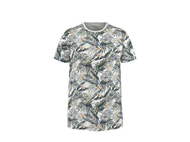 Robe t-shirt à imprimé tropical de feuilles et de fleurs dans des tons verts et beiges.
