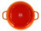 Plat de cuisson rond orange avec poignées et pictogrammes d'instructions d'utilisation
