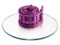 Un anneau de cuisine en silicone violet de la marque Coox.
