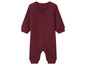 Une grenouillère bébé de couleur bordeaux avec des boutons.