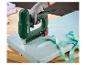 Agrafeuse électrique avec tissu et ruban sur une surface en bois, PET 25 E5, Type 55, Type 47