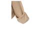 Gros plan d'une manche de veste en laine beige avec un poignet côtelé.
