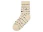 Chaussettes beiges avec un motif scandinave.