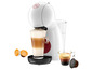 Une machine à café Nescafé Dolce Gusto blanche avec une tasse de cappuccino et un verre d'espresso.