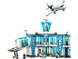 Jeu de construction d'aéroport avec terminal, avion et figurines.