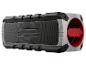 Enceinte Bluetooth portable grise et noire avec des accents rouges