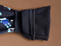 Un pantalon noir à imprimé robot avec une doublure en polaire