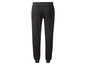Pantalon de jogging noir avec des ourlets élastiques.