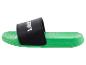 Des tongs Minecraft vertes avec une bande noire.