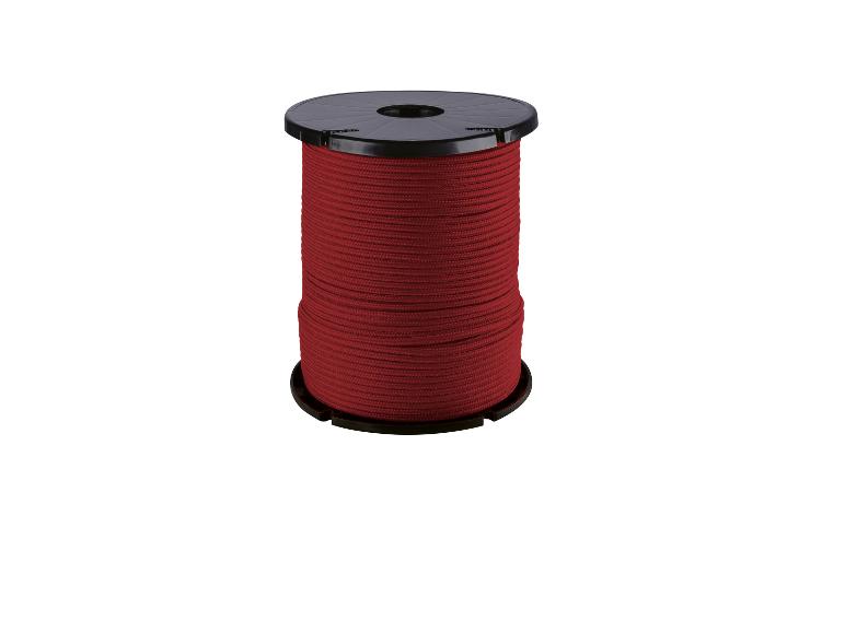 Corde rouge sur une bobine noire.