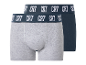 Deux boxers en coton, un gris et un bleu marine, avec une ceinture élastique texturée.