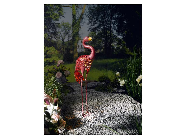 Lampe solaire décorative en forme de flamant rose, jardin.