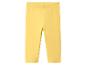 Legging jaune en coton pour enfant sur fond blanc.