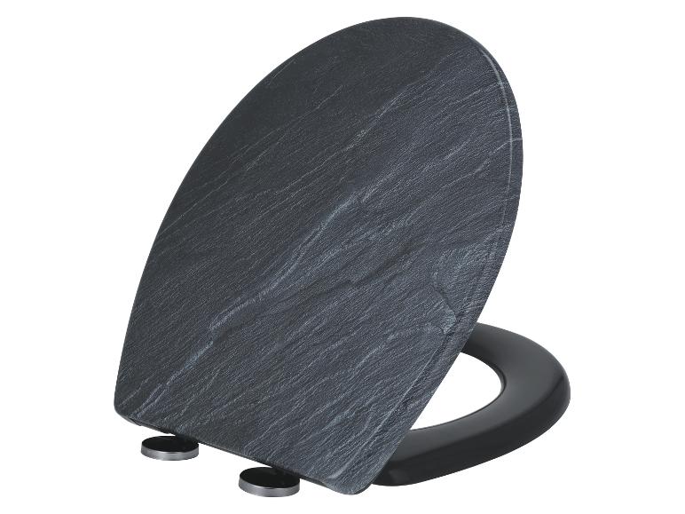 Abattant de toilettes gris foncé avec texture ardoise, dressé sur fond blanc.