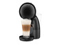 Une machine à café Krups Nespresso Dolce Gusto noire avec un verre de cappuccino.