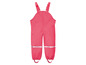 Salopette imperméable rose pour enfants.