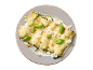 Cannellonis ricotta épinards avec parmesan et basilic frais sur une assiette grise.