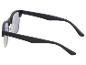 Lunettes de soleil noires avec verres gris et détails dorés, vue de dessus.