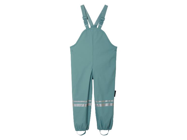 Salopette imperméable pour enfant avec bretelles réglables.