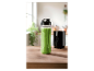 Un mixeur SilverCrest avec un smoothie vert prêt à boire.