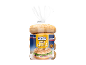 Paquet de 300g de bagels au sésame pré-tranchés avec un bagel ouvert garni.