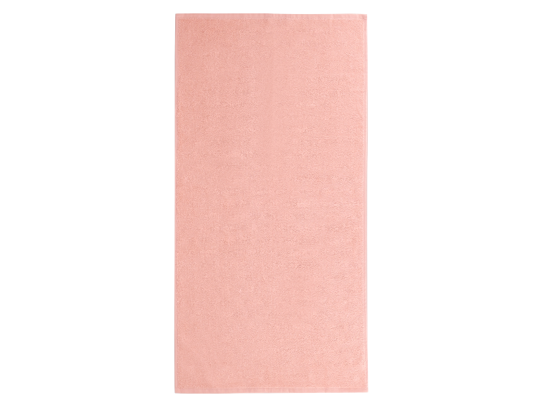 Serviette de bain rose clair.