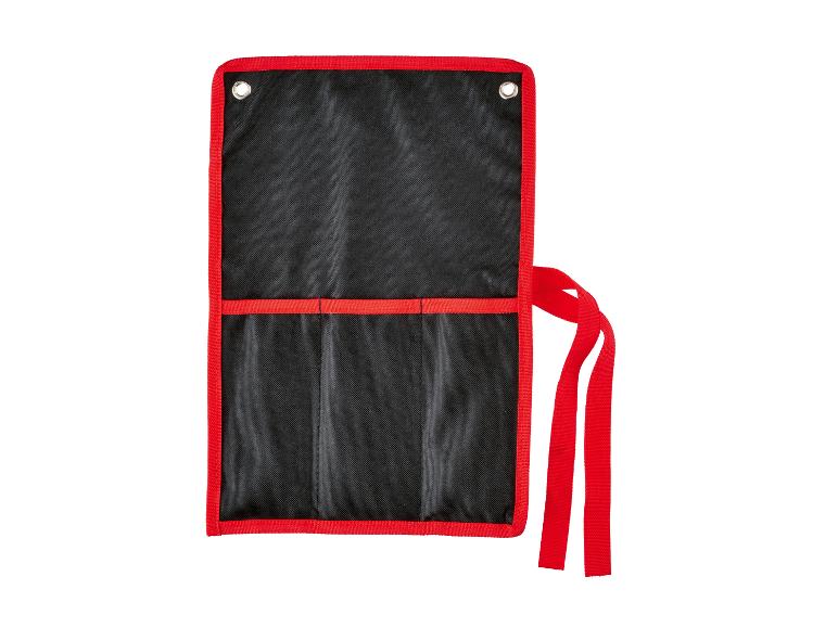 Organisateur d'outils noir avec bords et sangles rouges, ouvert.