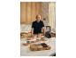 Andre Agassi en cuisine avec les couteaux premium SILVERCREST® à manche en noyer.
