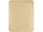 Une couverture rectangulaire beige clair aux coins arrondis.