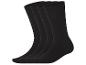 Quatre paires de chaussettes noires sur fond blanc