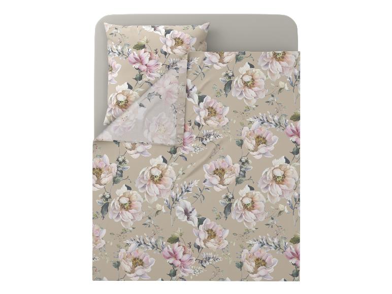 Parure de lit avec motif floral de pivoines roses claires et blanches sur fond beige.