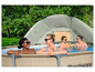 Une piscine Bestway avec une tente pour l'ombre.
