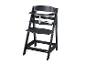 Chaise haute en bois noir pour bébé.