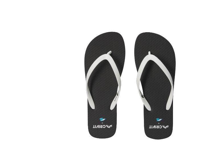 Tongs noires à lanières blanches, vues de dessus.