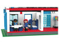 Un vétérinaire Lego avec un appareil à rayons X, une table et deux figurines.