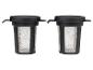 Deux filtres à thé en plastique noir.