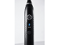 Brosse à dents électrique noire avec bouton marche/arrêt et indicateur de mode 'Brighten'.