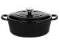 Cocotte en fonte noire avec poignées et couvercle à bouton argenté.
