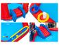 Piscine gonflable Spiderman avec toboggan et anneaux.