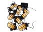 Guirlande lumineuse solaire de jardin avec cages métalliques noires et lumière jaune chaude.
