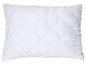 Oreiller blanc matelassé avec un motif ondulé