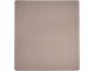 Gros plan d'une couverture matelassée de couleur marron clair ou beige